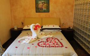 Abalon Pompei Resort客房内的一张或多张床位