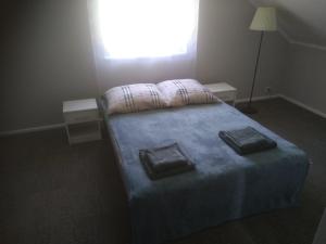 Posteľ alebo postele v izbe v ubytovaní Karolówka
