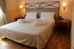 Katil atau katil-katil dalam bilik di Hotel Semifonte
