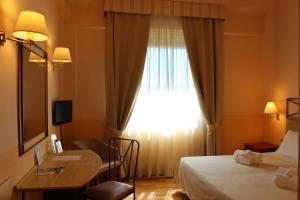 Postel nebo postele na pokoji v ubytování Hotel Semifonte + 37 fotografií