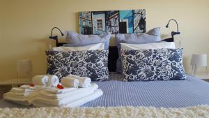 Katil atau katil-katil dalam bilik di Apartamento vista Douro e Mar