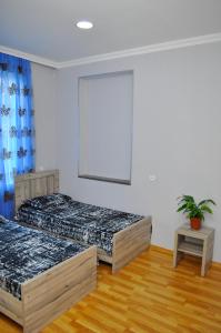Ένα ή περισσότερα κρεβάτια σε δωμάτιο στο Sofia Guest House