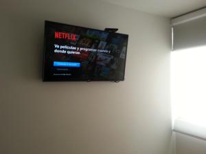 TV a/nebo společenská místnost v ubytování A Bogota On Holidays by Open - HOTEL CAS-EMBAJADA AMERICANA