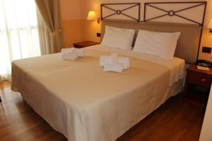 Katil atau katil-katil dalam bilik di Hotel Semifonte