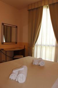 Katil atau katil-katil dalam bilik di Hotel Semifonte