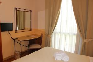 Katil atau katil-katil dalam bilik di Hotel Semifonte