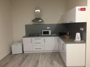 Kuchyň nebo kuchyňský kout v ubytování Apartmány Jarkova