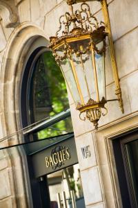 a chandelier hanging from the side of a building at Hotel Bagués, a Small Luxury Hotel of the World in Barcelona