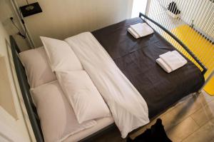 Säng eller sängar i ett rum på Apartment Fortuna