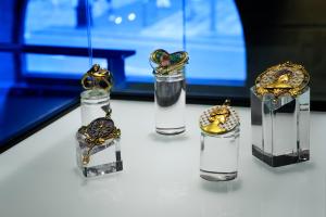 a group of three bottles with rings on them at Hotel Bagués, a Small Luxury Hotel of the World in Barcelona