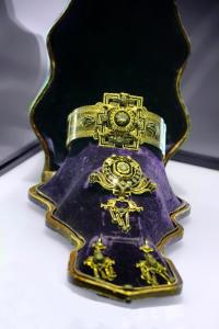a gold and purple vase on a table at Hotel Bagués, a Small Luxury Hotel of the World in Barcelona