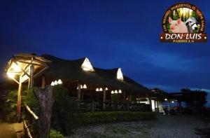 a restaurant with a sign that says dont lick at Hotel Boutique Quinta Tibigaro in San Vicente de Chucurí