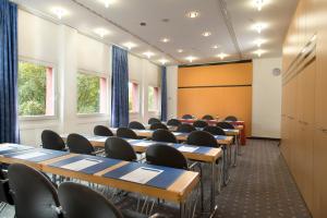The business area and/or conference room at TRYP by Wyndham Halle
