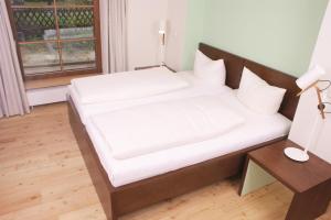 Posteľ alebo postele v izbe v ubytovaní Apartment Mohren