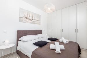 Posteľ alebo postele v izbe v ubytovaní Olea Residence + 33 fotografií