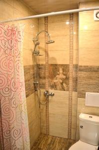 Koupelna v ubytování Central Apartment + 28 fotografií