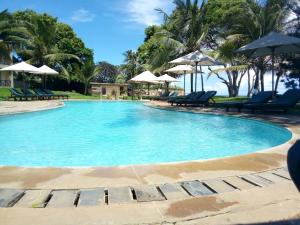 Bazén v ubytování Coral Beach Resort nebo v jeho okolí