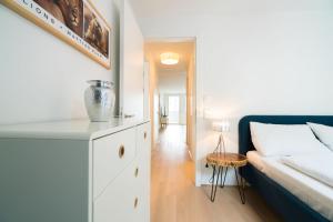 Łóżko lub łóżka w pokoju w obiekcie Vienna Residence | Spacious Serviced Apartment in Vienna directly at the U4
