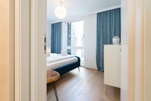 Łóżko lub łóżka w pokoju w obiekcie Vienna Residence | Spacious Serviced Apartment in Vienna directly at the U4