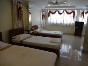 Postel nebo postele na pokoji v ubytování Hotel Susee Park