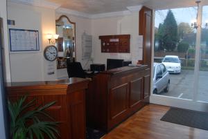 a waiting room with a car parked in a parking lot at Brecon Hotel Sheffield Rotherham in Rotherham