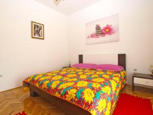 Postel nebo postele na pokoji v ubytování Apartments Blazenka 1270