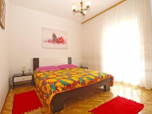 Postel nebo postele na pokoji v ubytování Apartments Blazenka 1270