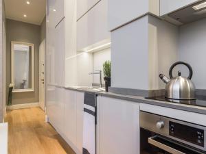 Kuchyňa alebo kuchynka v ubytovaní Milano Manzoni CLC Apartments