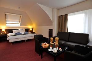 Posezení v ubytování Golden Tulip Hotel de’ Medici