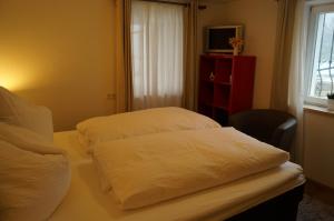 Postel nebo postele na pokoji v ubytování Traumhafte Ferienwohnung mit Pool