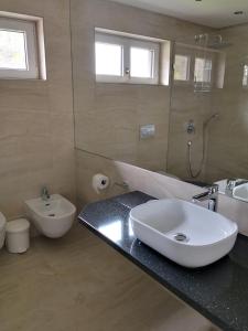 Koupelna v ubytování Hotel Milan Vopicka