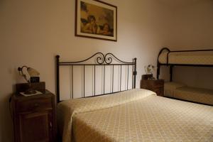 Posteľ alebo postele v izbe v ubytovaní Agriturismo San Fedele