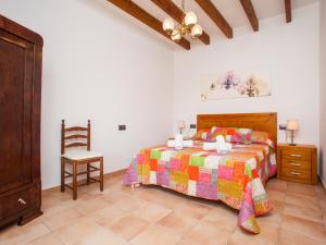A bed or beds in a room at Finca Ses Comes