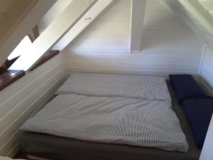 Un pat sau paturi într-o cameră la Bleichehof