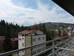 a view from the balcony of a building at Apartament Grażyna in Krynica Zdrój