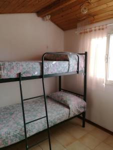 Postel nebo postele na pokoji v ubytování Casa Santa Gemma