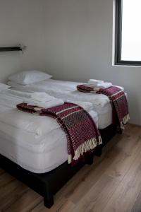 Postel nebo postele na pokoji v ubytování Brú Guesthouse