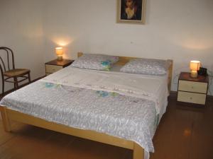 Postel nebo postele na pokoji v ubytování Apartment Sveti Jakov 37
