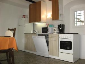 Kuchyň nebo kuchyňský kout v ubytování Apartment Sveti Jakov 37