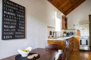 A kitchen or kitchenette at Clare Valley Heritage Retreat