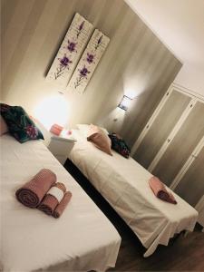 A bed or beds in a room at Apartamento T&T Ocean no Clube Praia da Rocha