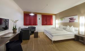 Ένα ή περισσότερα κρεβάτια σε δωμάτιο στο Pension Lichtenburg