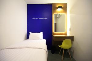 Postel nebo postele na pokoji v ubytování Tuk Tuk Hostel