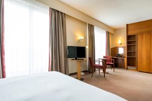 TV a/nebo společenská místnost v ubytování Astoria Hotel Antwerp