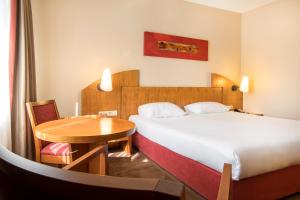 Postel nebo postele na pokoji v ubytování Astoria Hotel Antwerp + 24 fotografií
