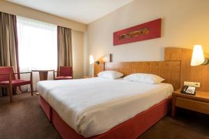 Postel nebo postele na pokoji v ubytování Astoria Hotel Antwerp
