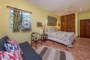 Ένα ή περισσότερα κρεβάτια σε δωμάτιο στο Casa Gatos