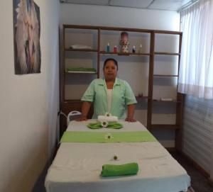 a man sitting at a table in a room at Club Tejamaniles in Los Azufres +166 photos