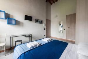 Postel nebo postele na pokoji v ubytování B&B Bianchi 64