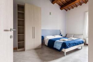 Postel nebo postele na pokoji v ubytování B&B Bianchi 64